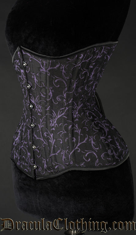 Side view of women's purple and black corset showing extreme waist shaping