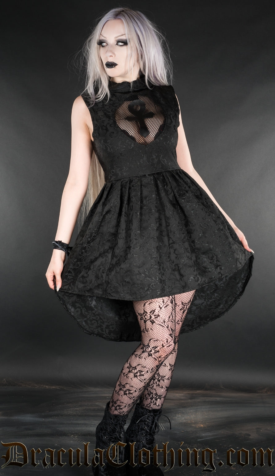 Short high low style women's dress worn by model