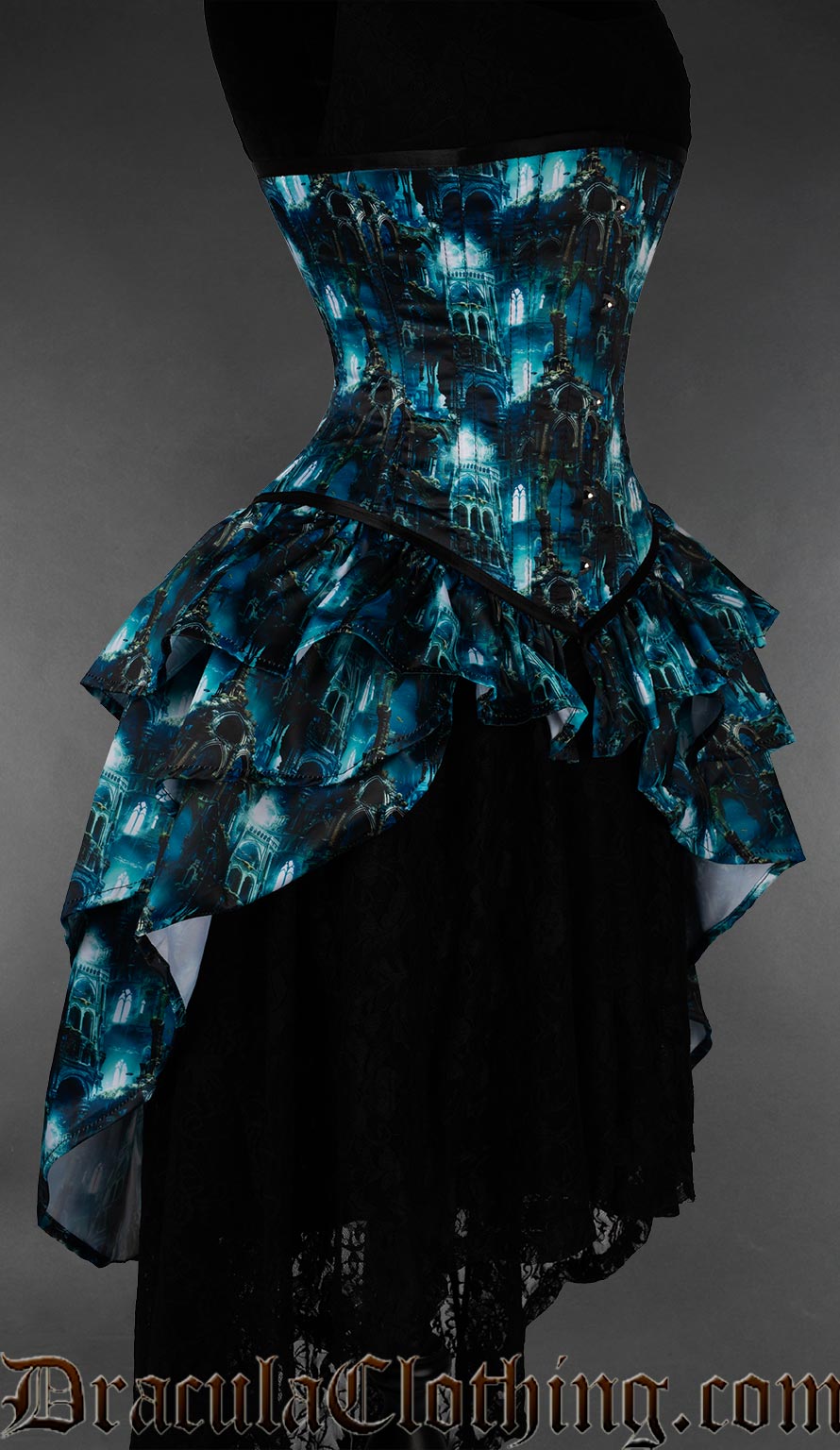 Side view of multicoloured black and blue corset with layered bustle attachment printed with an underwater city design