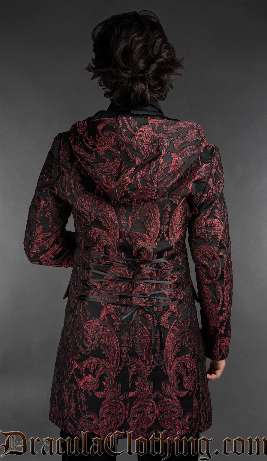Back view of Victorian gothic dobby jacket with red baroque pattern styled as formal alternative menswear