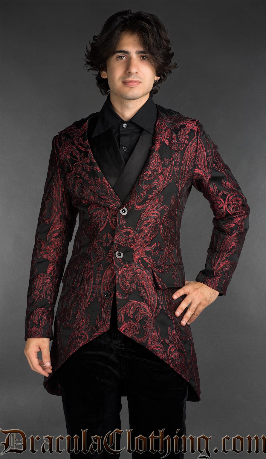 Hooded Victorian gothic dobby jacket with red baroque pattern styled as formal alternative menswear