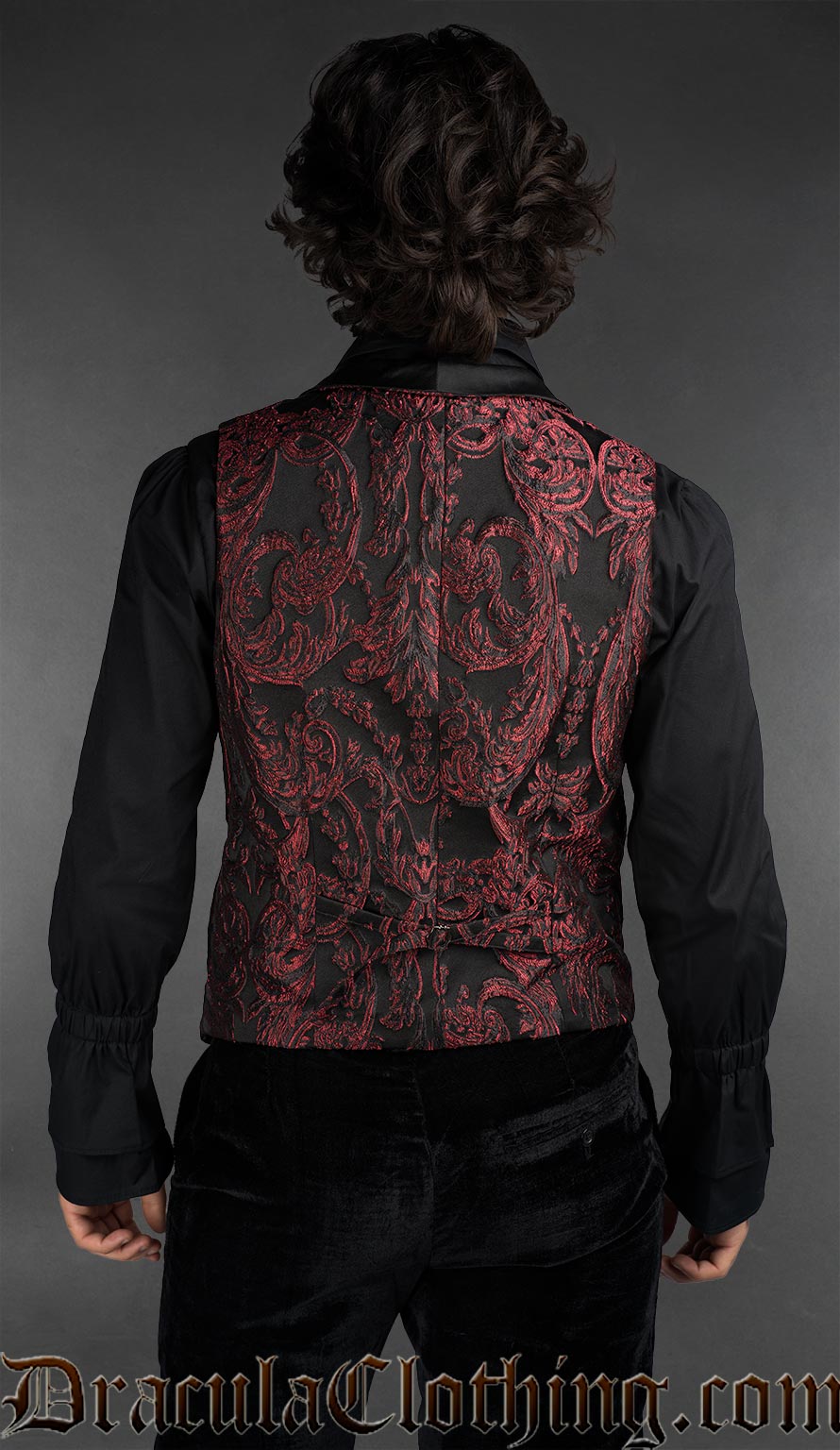 Back view of Victorian gothic dobby jacket with red baroque pattern styled as formal alternative menswear