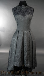 Black brocade women's dress featuring a bat shaped collar