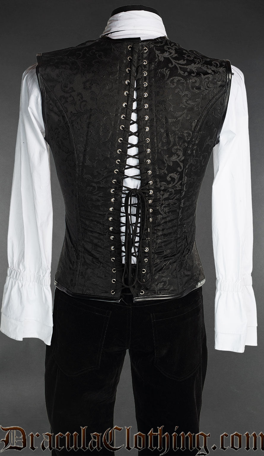 Back view of men's black and purple brocade corset vest showing adjustable lacing in the back