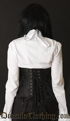Back view of model wearing black brocade underbust corset showing matching modesty panel and adjustable lacing