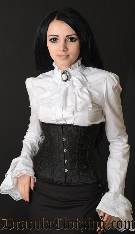 Model wearing black brocade underbust corset over a white blouse