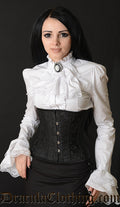 Model wearing black brocade underbust corset over a white blouse