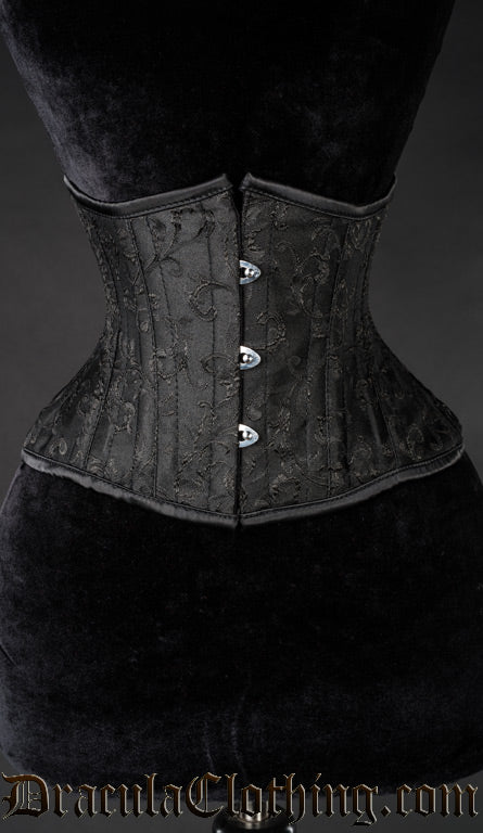 Black waist cincher made with black brocade cotton material in an extreme waist style