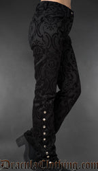 Side view of black gothic brocade officer pants with metal buttons along the lower leg on a gray background