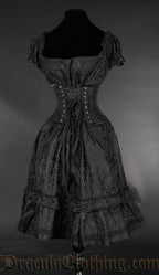 Back view of women's black brocade dress shown with waist cincher