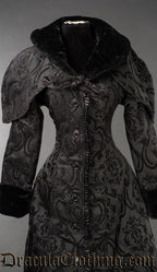 Front view of black brocade hood shown over matching women's coat