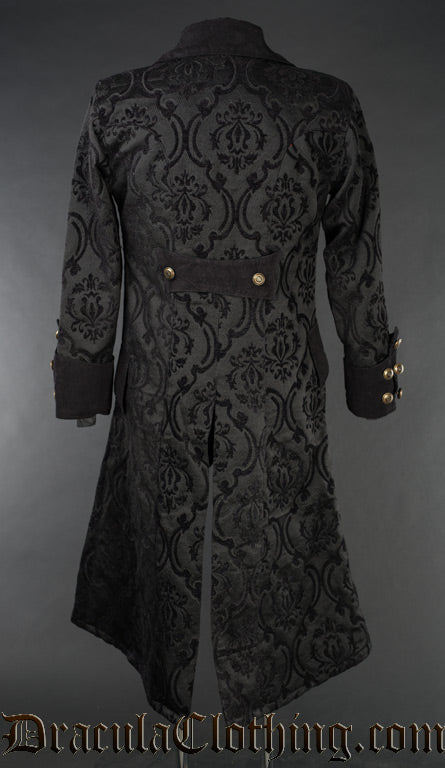 Back view of men's black brocade pirate coat showing decorative gold coloured buttons on sleeve cuffs and back half belt