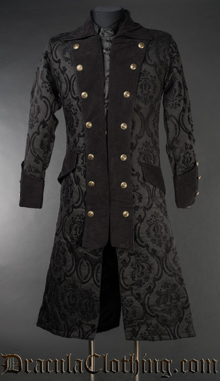 Men's pirate inspired coat made from thick black brocade fabric with velvet accents in an open double breasted style with decorative gold coloured buttons