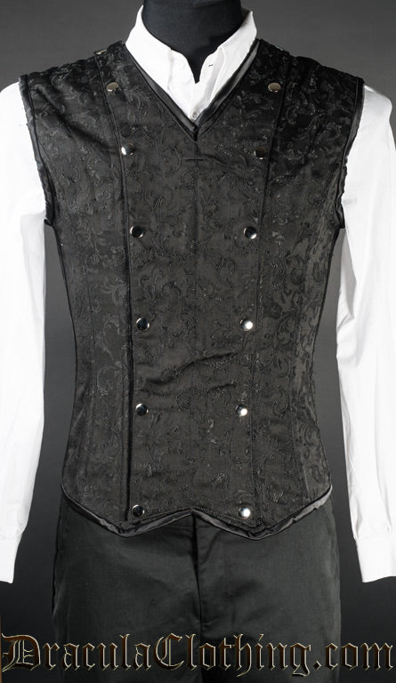 Men's v-shaper vest made in black brocade fabric with two rows of silver coloured poppers either side
