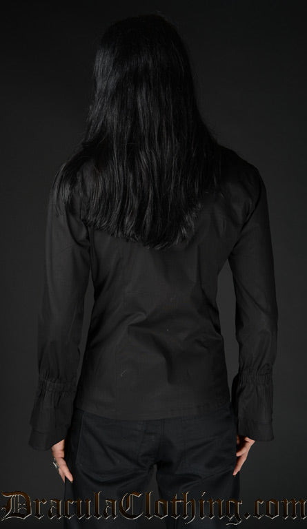 Back view of model wearing black cotton long sleeved shirt