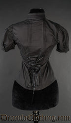 Back view of women's black edwardian blouse showing adjustable lacing in back