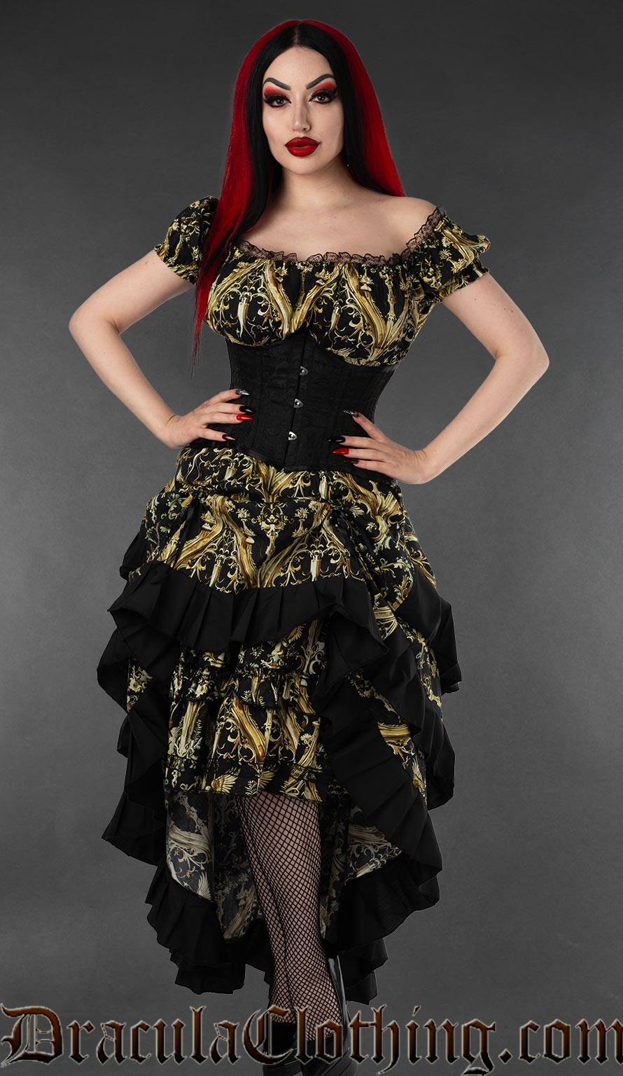 Black and gold cherub print layer bustle skirt with corset waist worn by a model against a gray background