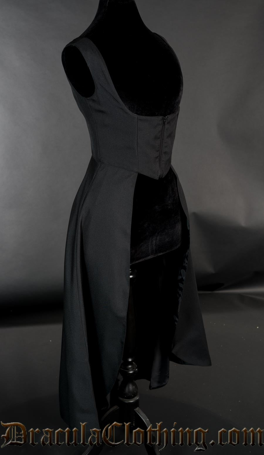 Women's black dress with openbust design short bodice with front closure and long tailcoat style skirt
