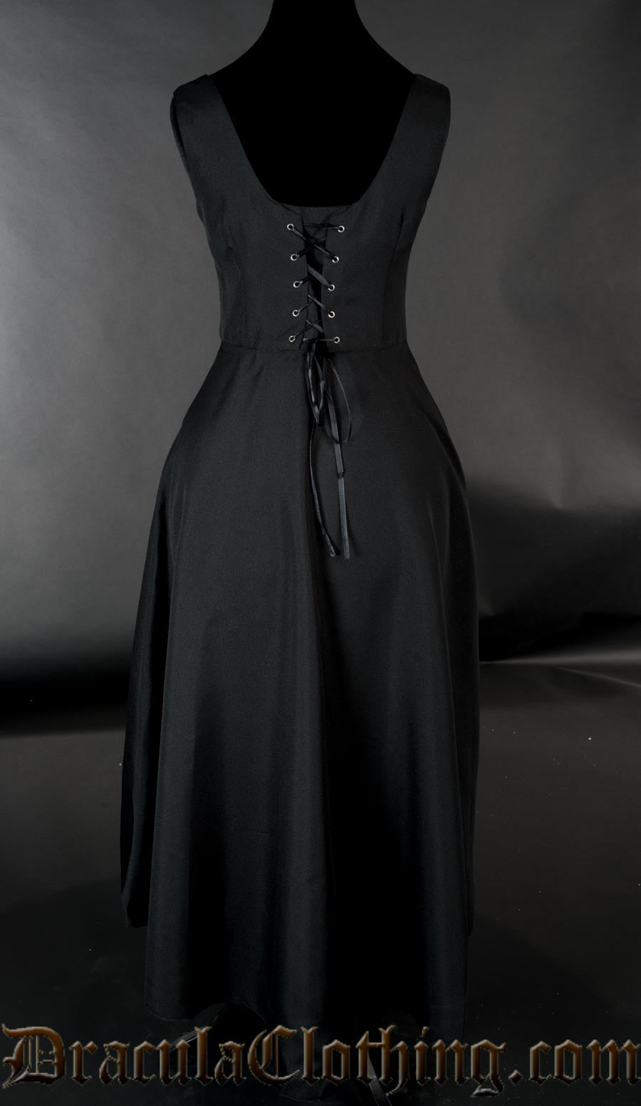 Back view of women's jinx dress showing adjustable lacing in the torso and long skirt in the back