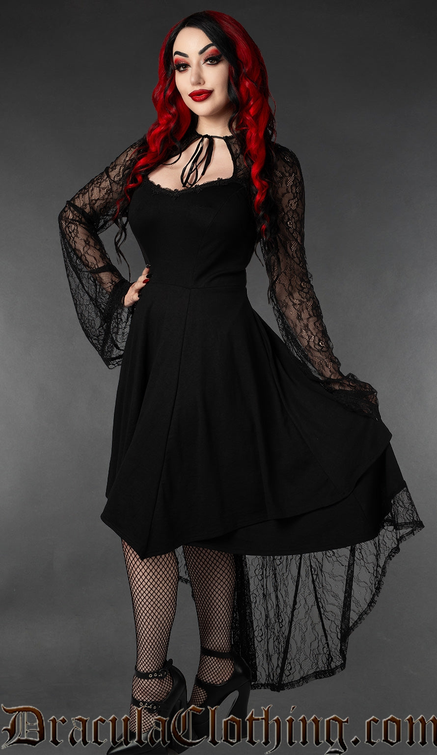 Women's black knee length dress with high low style lace overlay and sheer lace trumpet sleeves