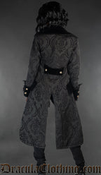 Back view of pirate inspired black women's coat worn by a model and showing tailcoat style split in back of coat