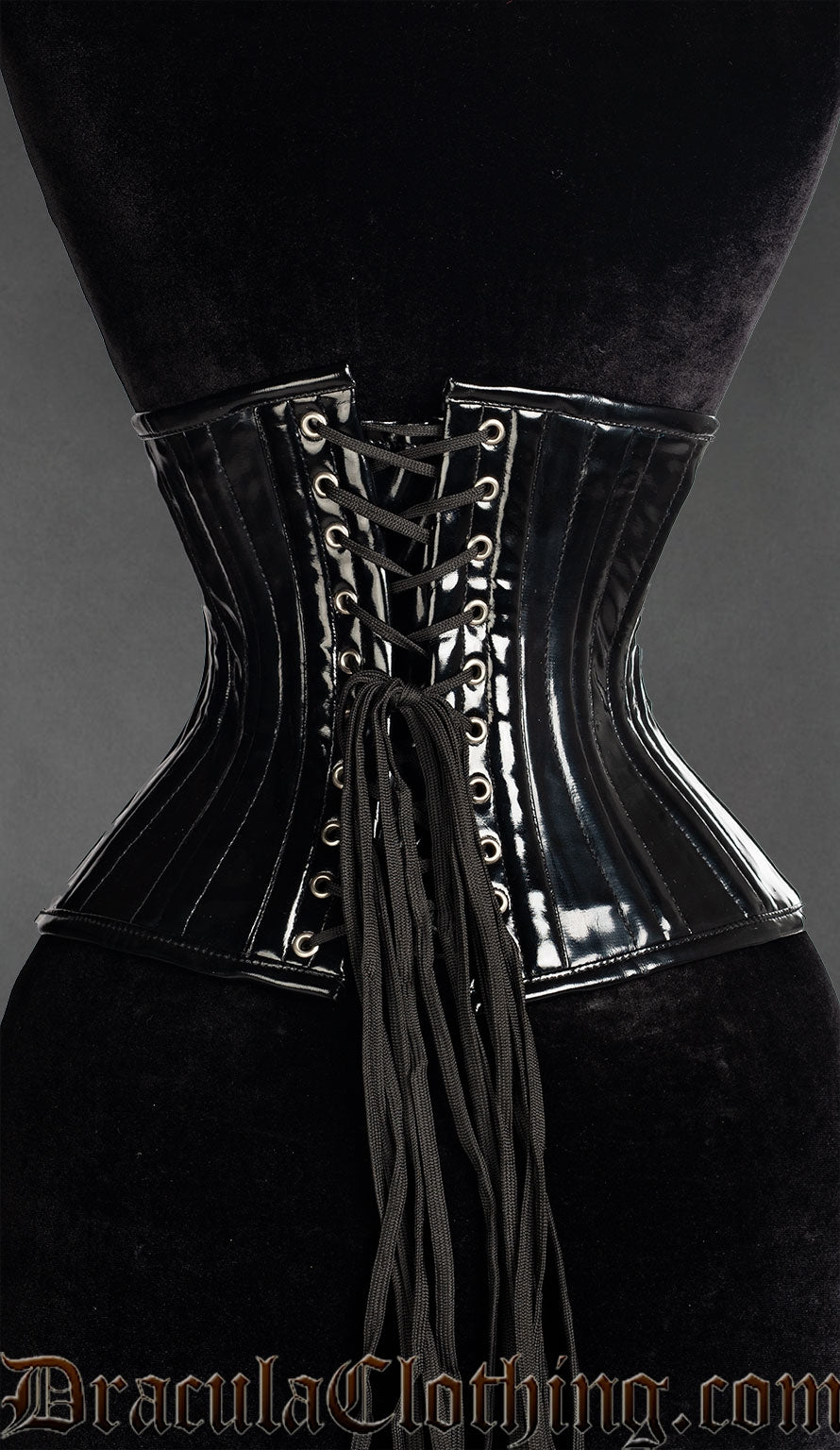 Back view of black pvc double boned waist cincher showing matching material modesty panel and adjustable lacing