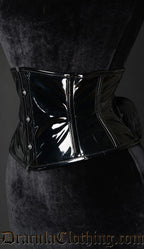 Side view of black waist cincher made with PVC material showing shaping