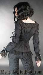 Back view of model wearing women's black long sleeve shirt with elasticated back and lace details
