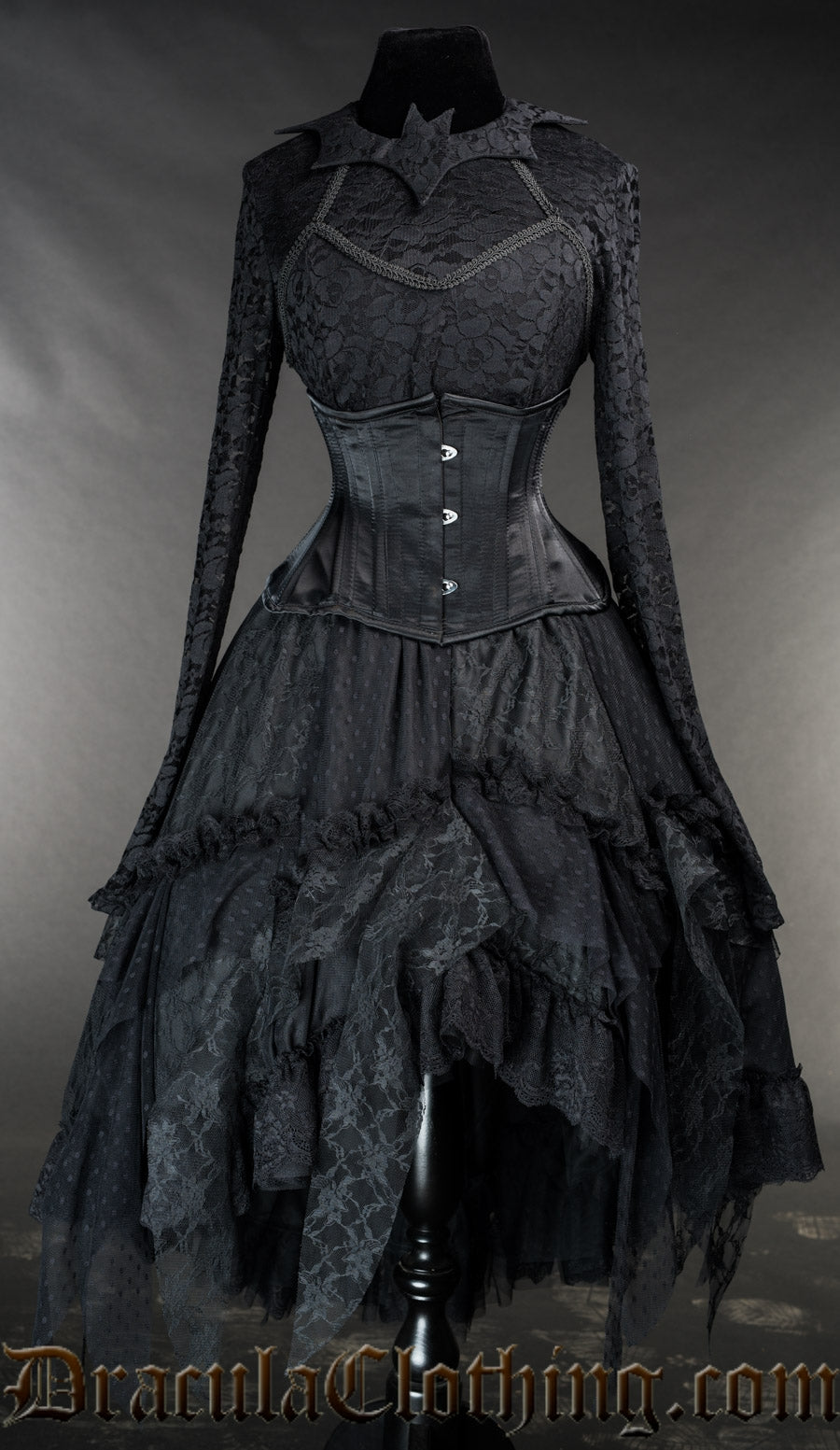 Black ruffle skirt pictured with additional lace top and black satin waist cincher