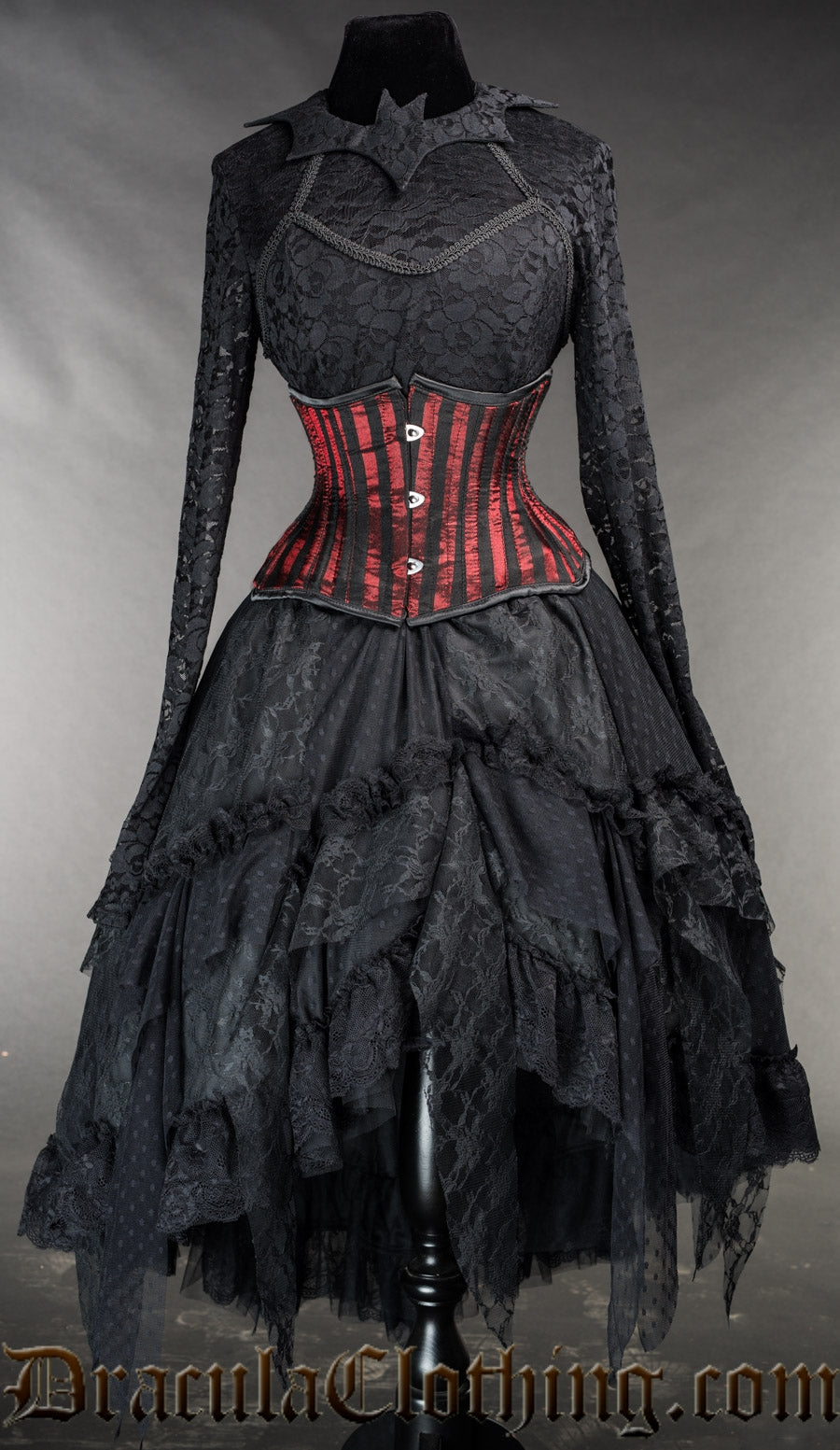 Women's black ruffle skirt made with layers of lace and satin for volume shown with additional top and corset