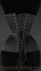 Back view of black satin extreme waist corset showing adjustable lacing and matching modesty panel