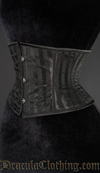 Side view of black waist cincher with black vertical stripes