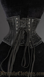 Back view of black vertical striped waist cincher showing adjustable lacing in the back and matching modesty panel
