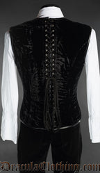 Back view of men's black velvet corset vest showing adjustable lacing