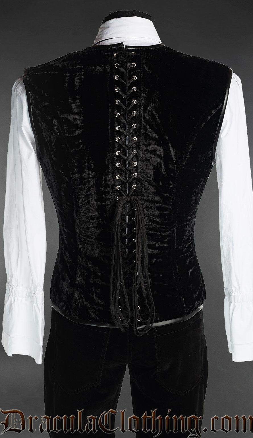 Back view of men's black velvet corset vest showing adjustable lacing