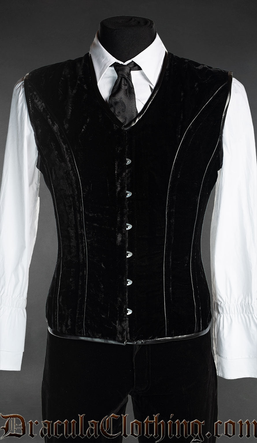 Men's v-shaper corset vest made from black velvet with faux leather piping