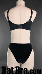 Back view of women's black bra showing traditional bra hook closure