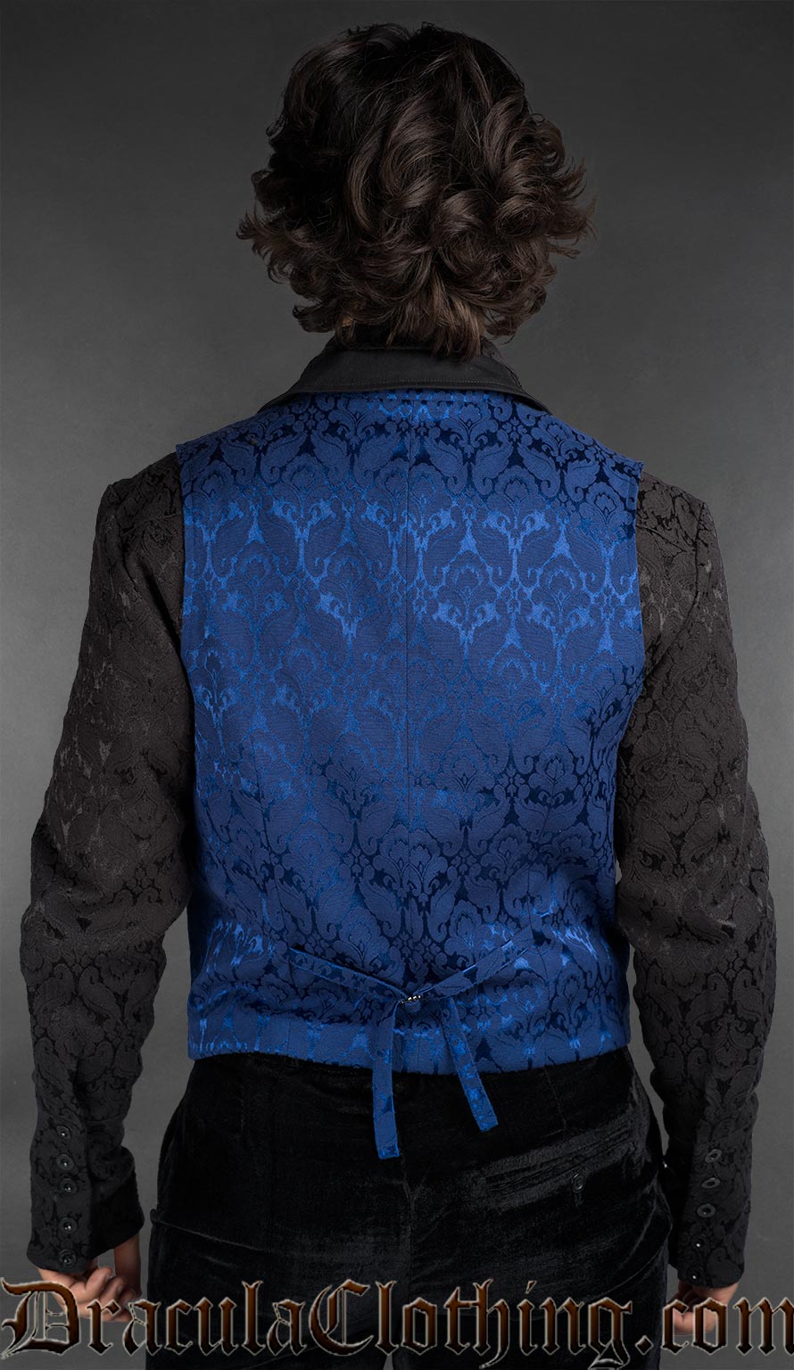 Back view of Gothic blue brocade double-breasted waistcoat for men with peak lapel and tailored fit