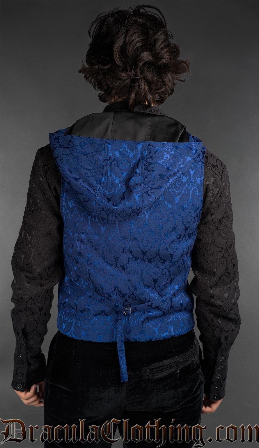 Back view of Gothic blue brocade hooded vest for men featuring baroque pattern and tailored fit