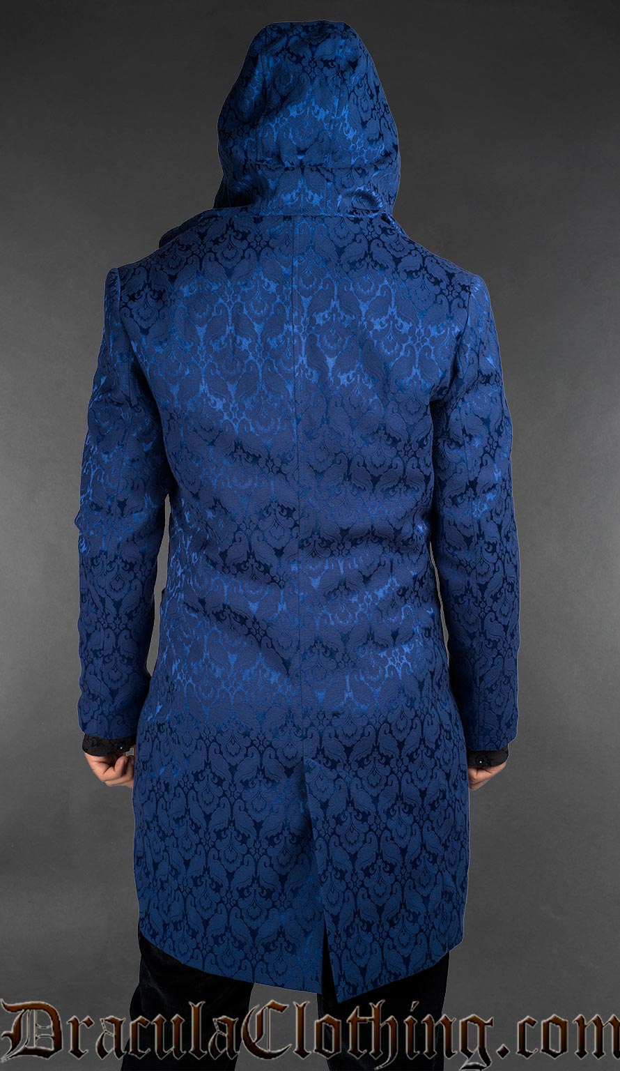Back view of Men’s blue brocade gothic hooded jacket with velvet lapels and tailored fit