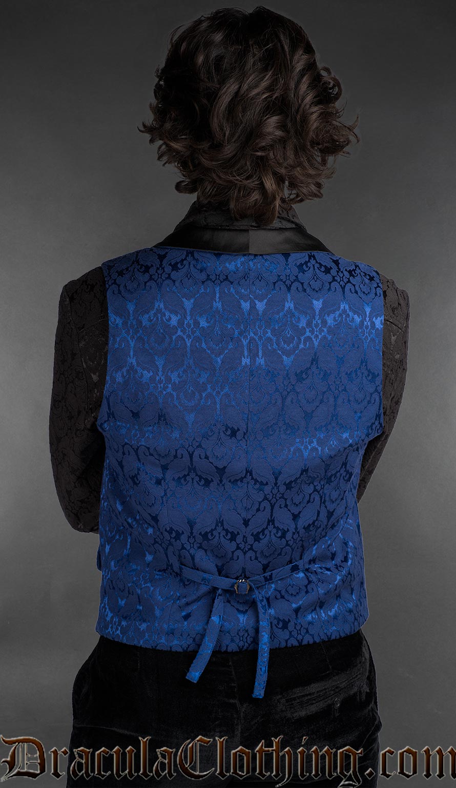 Back view of Men’s blue brocade Victorian gothic double-breasted waistcoat with black lapel, alternative formalwear