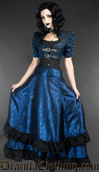 Model wearing blue bustle skirt with black waist cincher and matching blue bolero