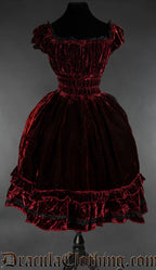 Women's bordeaux red velvet dress with elasticated waist bust and sleeves and black lace trim
