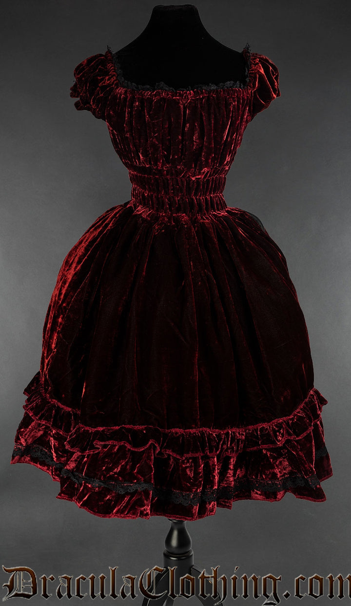 Women's bordeaux red velvet dress with elasticated waist bust and sleeves and black lace trim