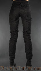 Back view of black brocade women's pants with lacing and ankh motif details