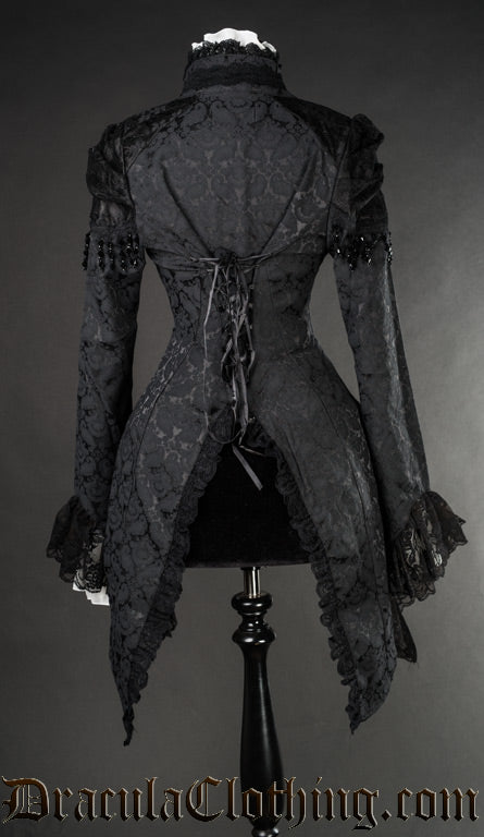 Back of women's tailcoat in black brocade fabric showing split tailcoat design and adjustable lacing in the torso