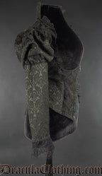 Side view of women's openbust jacket showing dramatic puffed shoulders amd black lace trim on the long sleeve cuffs