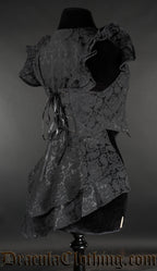 Side and back view of women's brocade tailcoat showing capped sleeves adjustable lacing in the back and longer tailcoat style back
