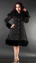 Women's knee length button up black jacquard coat in damask pattern with faux fur accents