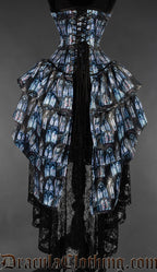 Back view of bustle corset with cathedral window printed design showing layered skirt and adjustable lacing with modesy panel